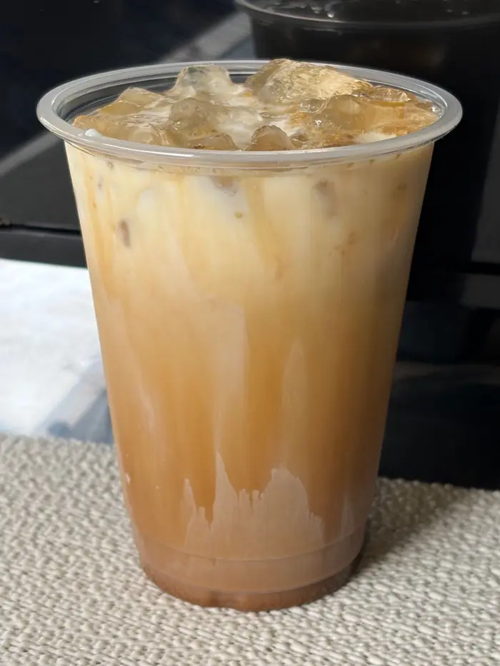 Iced dirty chai over ice from Upside Down Coffee on the Go