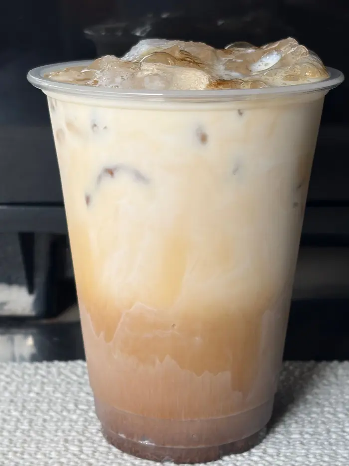 Iced coffee over ice from Upside Down Coffee on the Go